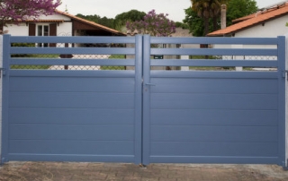 residential blue steel driveway gates